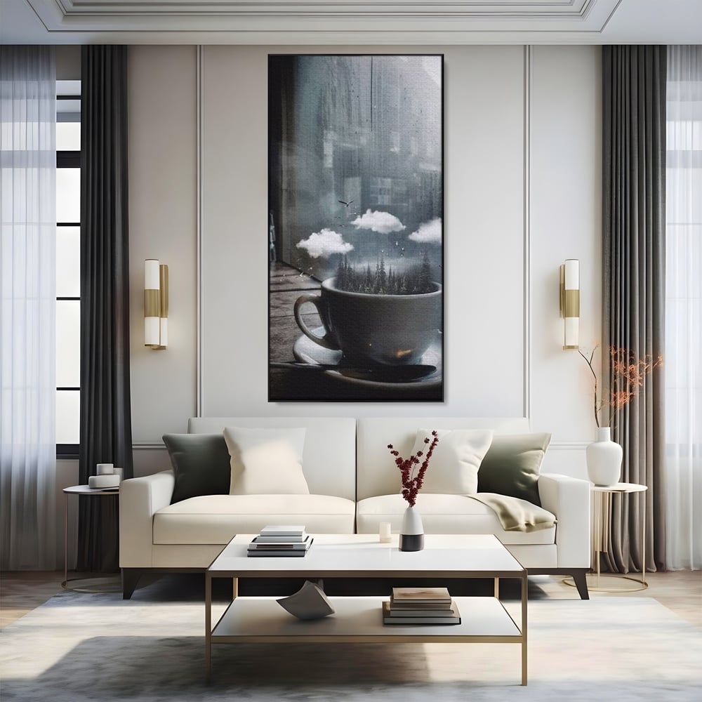 Tablou canvas cu ceasca de cafea cu padure si nori, in rama de aluminiu negru, pe perete intr-un living